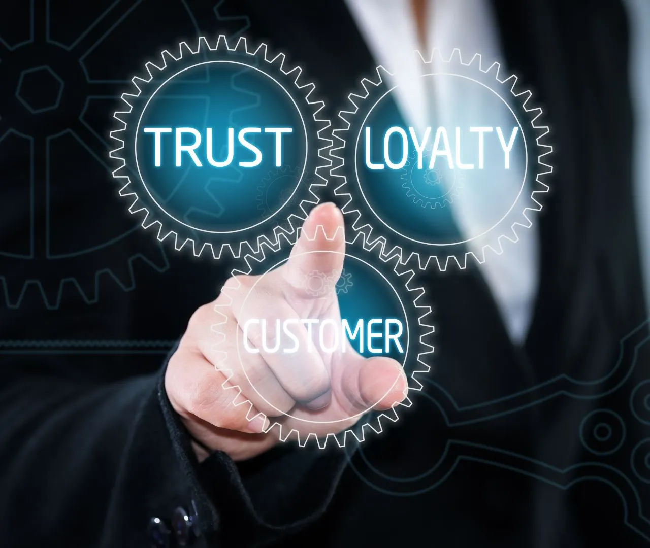 A businessperson pointing to interconnected gears labeled "Trust," "Loyalty," and "Customer," representing a commitment to client success and strong partnerships in providing SEO services for dental practices.