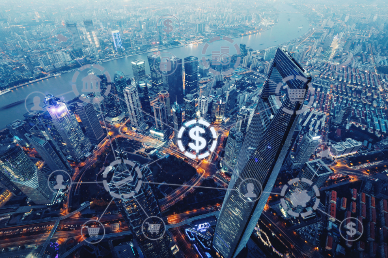 Aerial view of a financial district with digital icons overlaid, symbolizing the enhancement of lead generation and search engine ranking for a financial services firm through a targeted NetSuite SEO strategy.